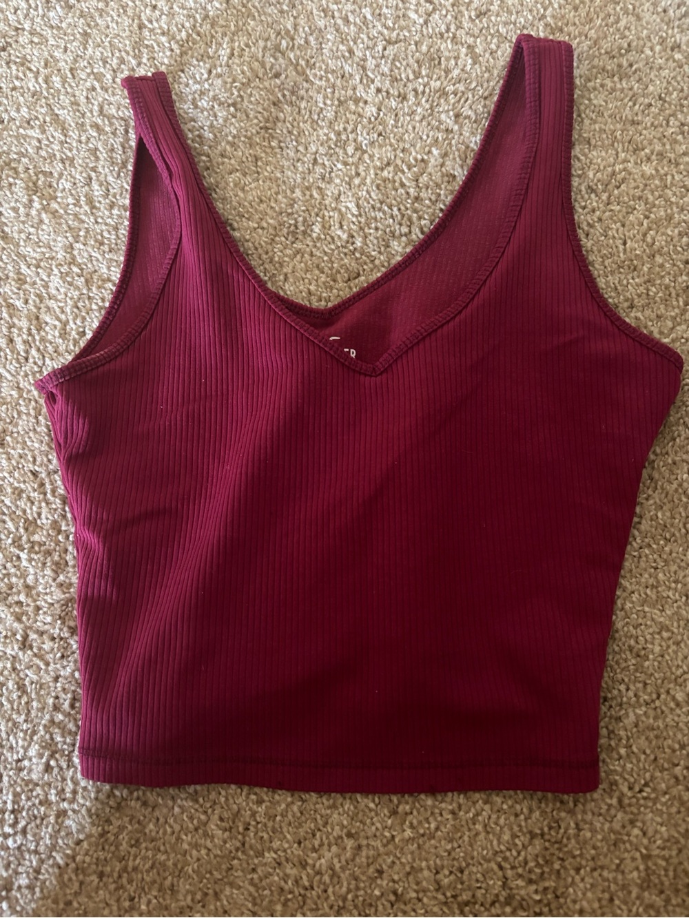 blue and purple ribbed hollister tanks